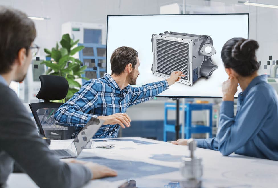 Modern Factory Office Meeting Room: Diverse Team of Engineers, Managers and Investors Talking at Conference Table, Use Interactive TV, Analyze Sustainable Energy Engine Blueprints. High-Tech Facility
