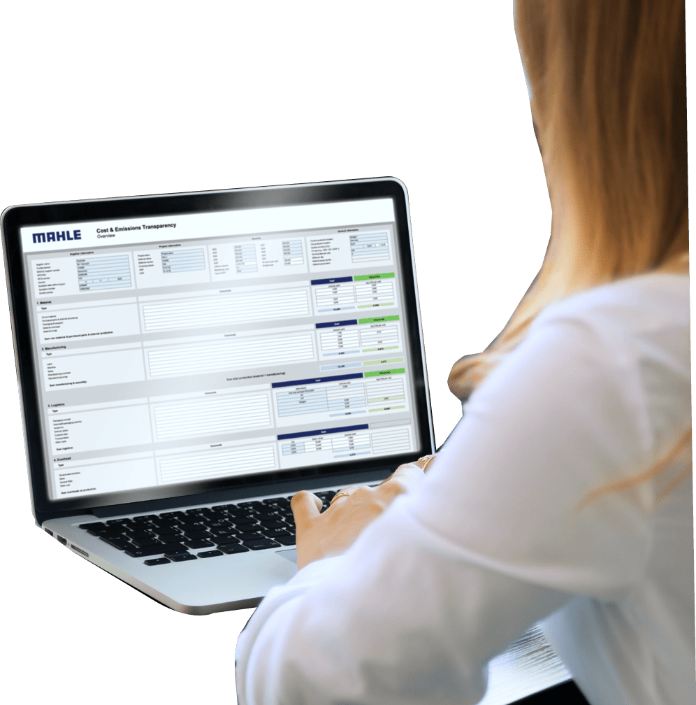 Back view of businesswoman speak using Webcam conference on laptop with diverse colleagues, female employee talk on video call with multiracial coworkers engaged in online briefing from home