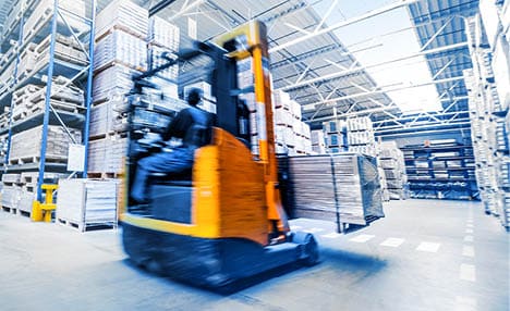 Forklift loader in storage warehouse ship yard. Distribution products. Delivery. Logistics. Transportation. Business background