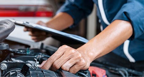 Automobile mechanic repairman hands repairing a car engine automotive workshop with a wrench, car service and maintenance,Repair service.